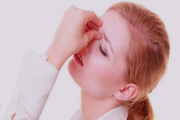 What are the causes of sharp pain in the nose